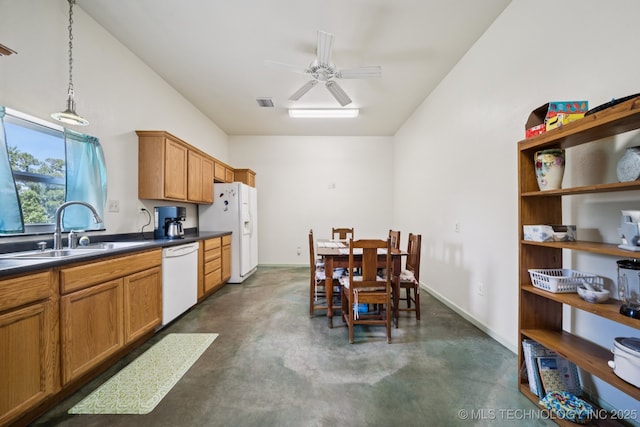 4127 New Prue Rd, Sand Springs, OK 74063 - kitchen featuring white appliances, concrete flooring, dark countertops, ceiling fan, and pendant lighting