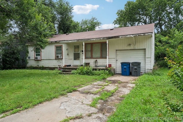 1012 N Irvington St, Tulsa, OK 74115 - single story home with concrete driveway, a garage, roof with shingles, a front yard, and cooling unit
