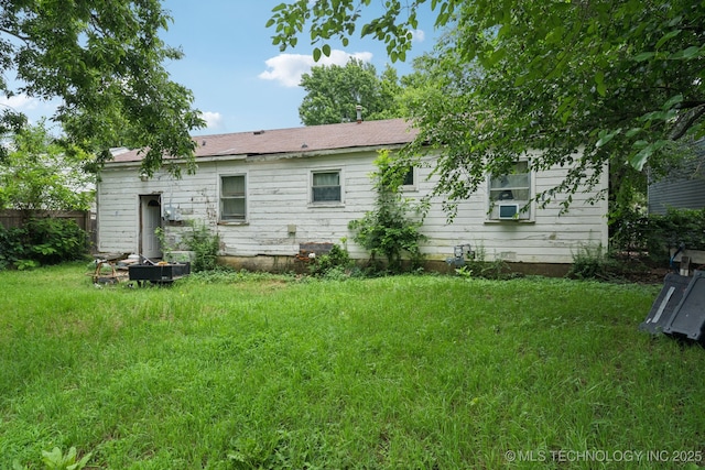 1012 N Irvington St, Tulsa, OK 74115 - back of house featuring cooling unit
