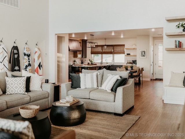 118900 S 4213, Eufaula, OK 74432 - living room with a high ceiling, wood finished floors, and recessed lighting