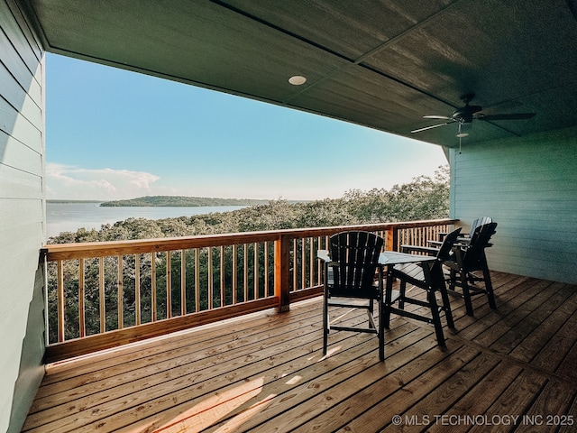 118900 S 4213, Eufaula, OK 74432 - deck with a water view, a ceiling fan, and outdoor dining space