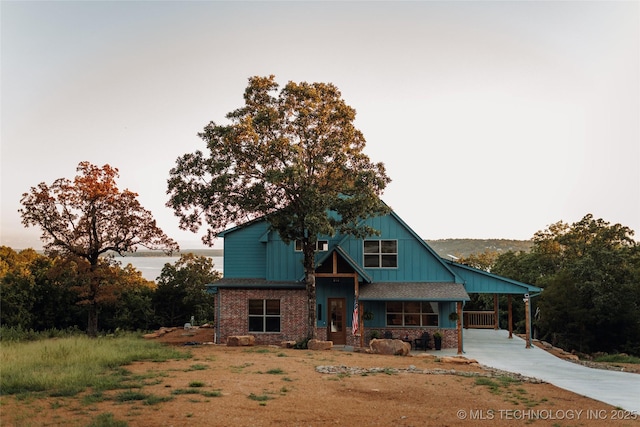 118900 S 4213, Eufaula, OK 74432 - view of front of home with concrete driveway, a carport, and a porch