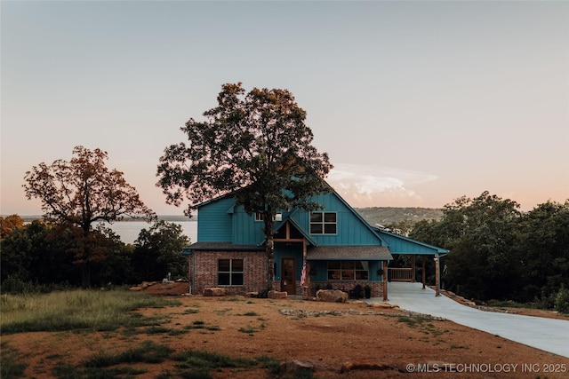 118900 S 4213, Eufaula, OK 74432 - view of front of home featuring concrete driveway and covered porch