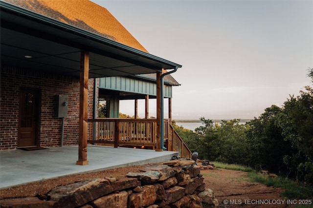 118900 S 4213, Eufaula, OK 74432 - view of property exterior featuring covered porch and brick siding