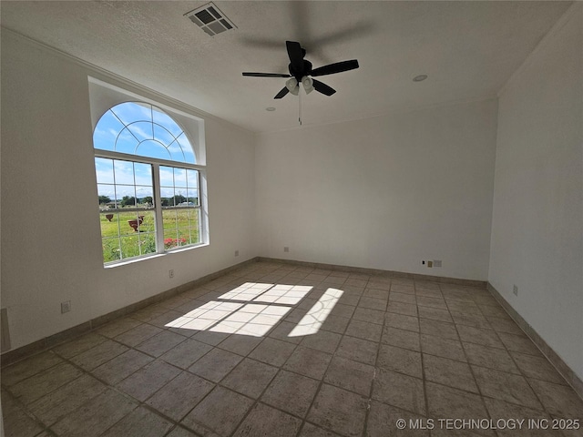 38032 State Road 78 W, Durant, OK 74701 - spare room featuring ceiling fan and baseboards