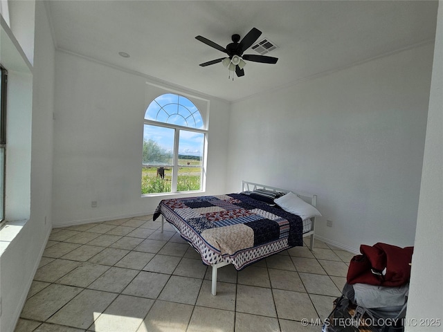 38032 State Road 78 W, Durant, OK 74701 - bedroom with light tile patterned floors, ornamental molding, and ceiling fan