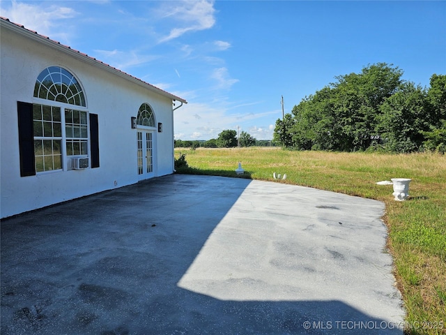 38032 State Road 78 W, Durant, OK 74701 - view of patio featuring french doors and cooling unit