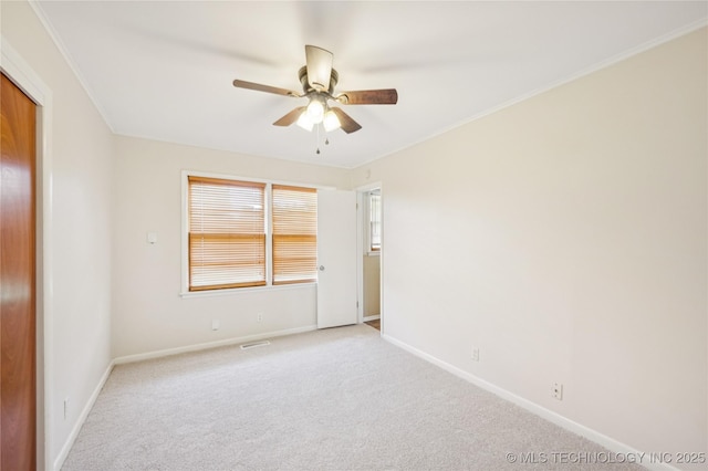 2178 S 76th E Ave, Tulsa, OK 74129 - unfurnished room featuring ceiling fan, carpet floors, and ornamental molding