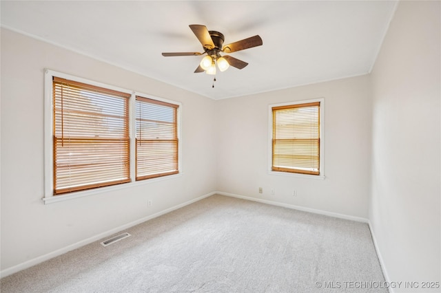 2178 S 76th E Ave, Tulsa, OK 74129 - carpeted empty room with plenty of natural light and ceiling fan