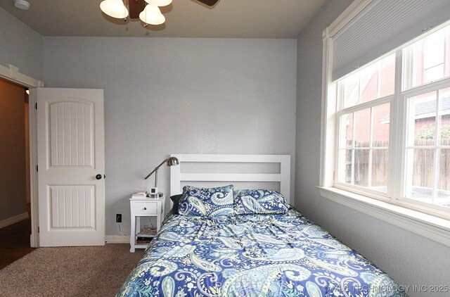 2463 S Park Hl, Tahlequah, OK 74464 - bedroom featuring carpet flooring and a ceiling fan