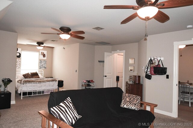 2463 S Park Hl, Tahlequah, OK 74464 - carpeted bedroom with baseboards and a ceiling fan