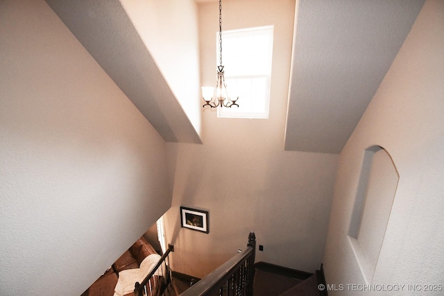 2463 S Park Hl, Tahlequah, OK 74464 - stairway featuring a chandelier