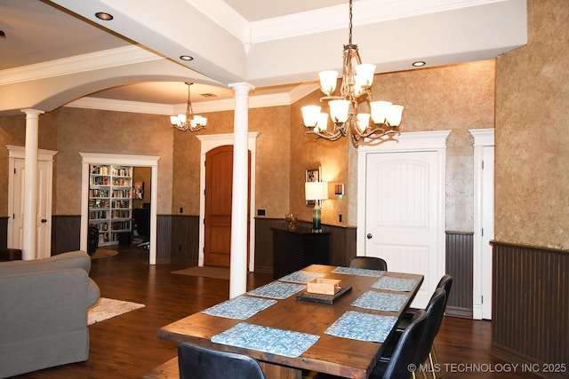 2463 S Park Hl, Tahlequah, OK 74464 - dining room featuring a chandelier, arched walkways, crown molding, wood finished floors, and decorative columns