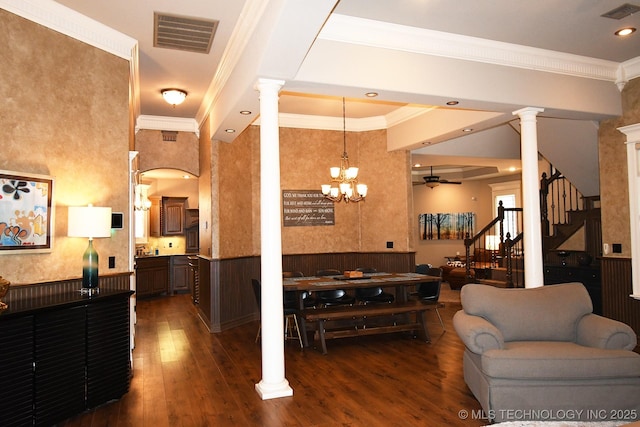 2463 S Park Hl, Tahlequah, OK 74464 - living room with ornate columns, dark wood-type flooring, stairway, crown molding, and a ceiling fan