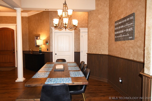 2463 S Park Hl, Tahlequah, OK 74464 - dining area featuring wainscoting, wood finished floors, a chandelier, decorative columns, and crown molding