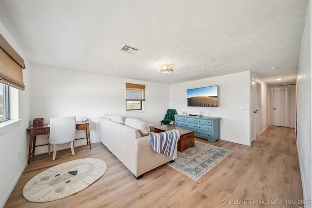 7482 N 439, Adair, OK 74330 - living room featuring light wood-style flooring