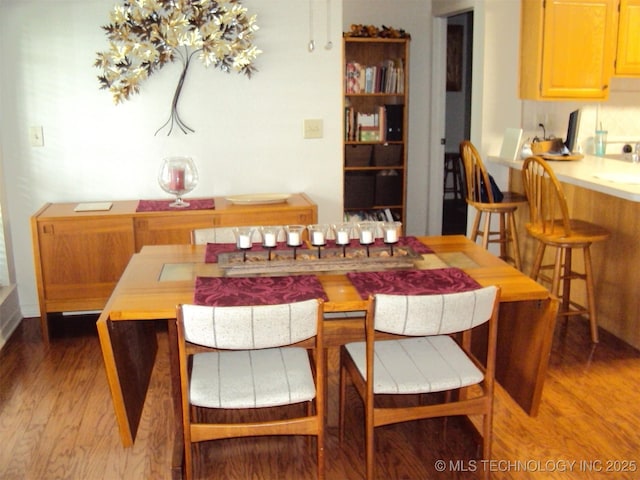 8303 E 77th Pl, Tulsa, OK 74133 - dining room featuring wood finished floors