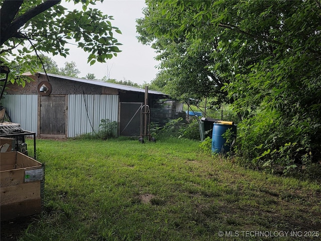14177 E 590th Rd S, Inola, OK 74036 - view of grassy yard featuring an outbuilding