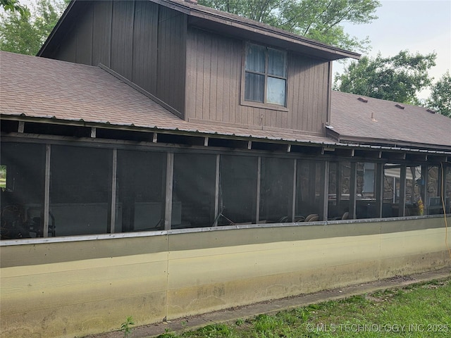 14177 E 590th Rd S, Inola, OK 74036 - rear view of property with a sunroom and a shingled roof