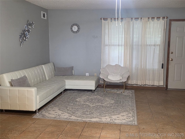 14177 E 590th Rd S, Inola, OK 74036 - living room featuring a textured ceiling