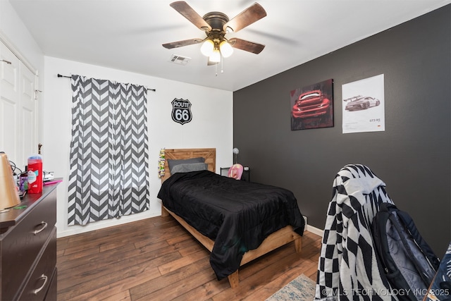 30103 S 4210th Rd, Inola, OK 74036 - bedroom featuring dark wood finished floors and a ceiling fan