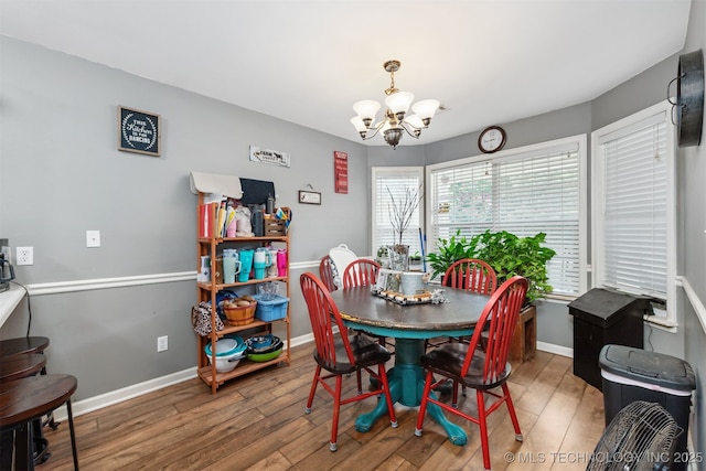 30103 S 4210th Rd, Inola, OK 74036 - dining space with a chandelier and wood finished floors