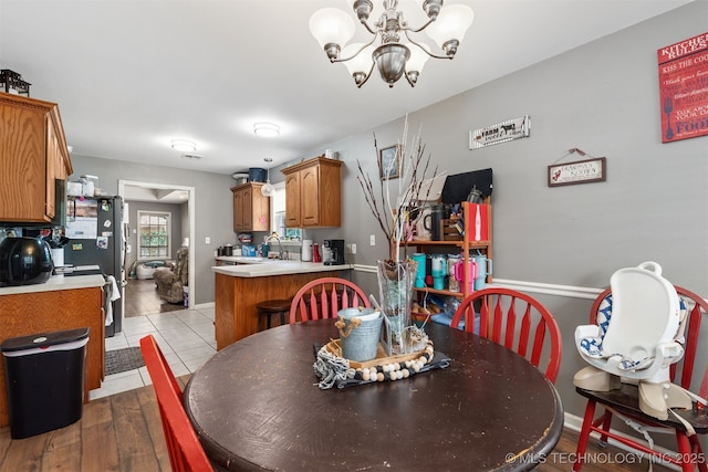 30103 S 4210th Rd, Inola, OK 74036 - dining room with a chandelier and wood finished floors