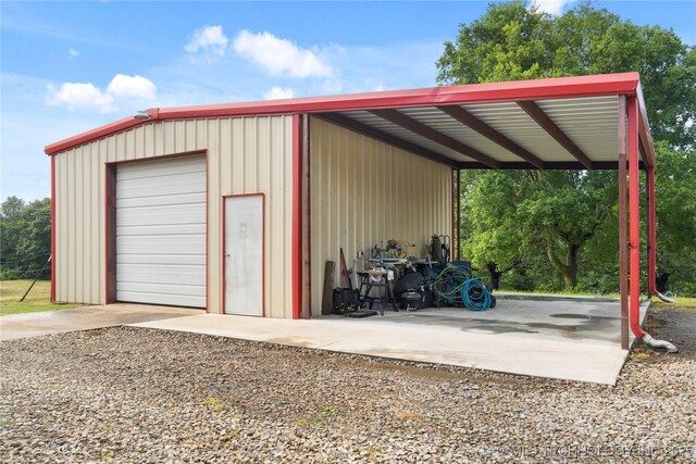 110094 S 4680th Rd, Gans, OK 74936 - view of outdoor structure featuring concrete driveway