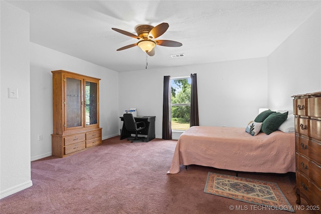 110094 S 4680th Rd, Gans, OK 74936 - bedroom with carpet flooring, a desk, and a ceiling fan