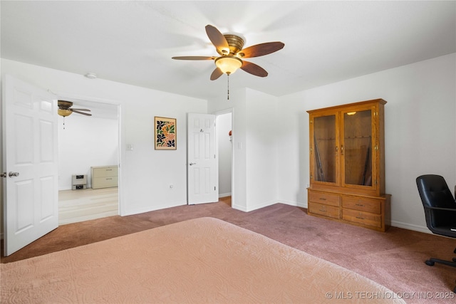 110094 S 4680th Rd, Gans, OK 74936 - unfurnished bedroom featuring carpet flooring and ceiling fan