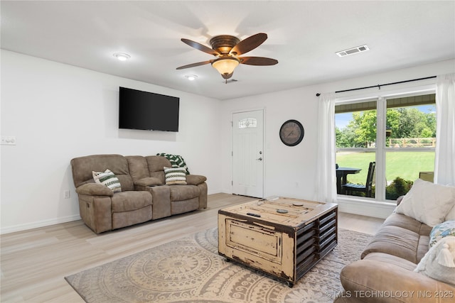 110094 S 4680th Rd, Gans, OK 74936 - living area with light wood finished floors and a ceiling fan