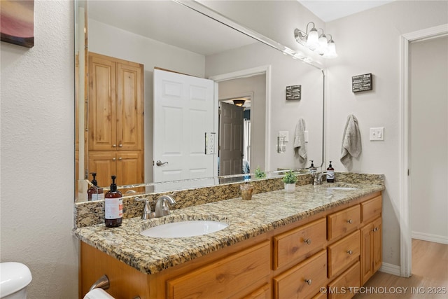 110094 S 4680th Rd, Gans, OK 74936 - full bath featuring double vanity and wood finished floors