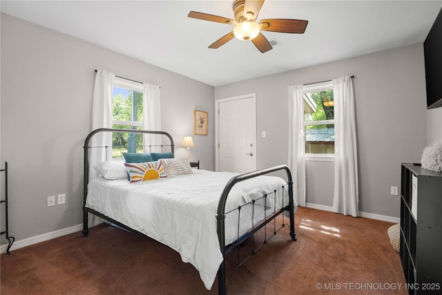 110094 S 4680th Rd, Gans, OK 74936 - carpeted bedroom with baseboards and ceiling fan