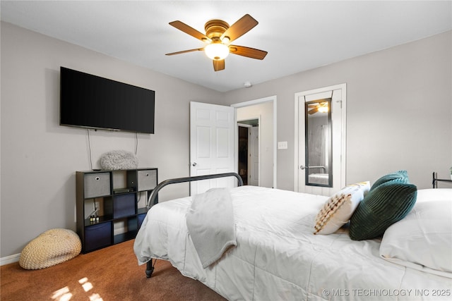 110094 S 4680th Rd, Gans, OK 74936 - carpeted bedroom featuring a ceiling fan and baseboards