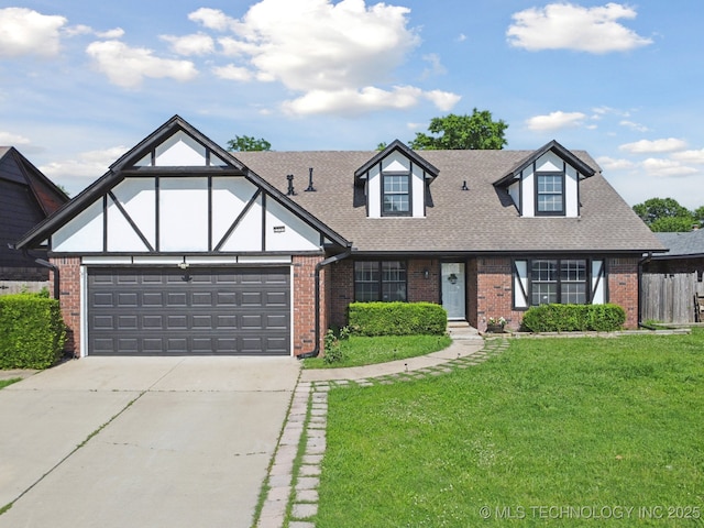 2331 S 99th E Ave, Tulsa, OK 74129 - view of front of property featuring brick siding, driveway, a garage, and a shingled roof