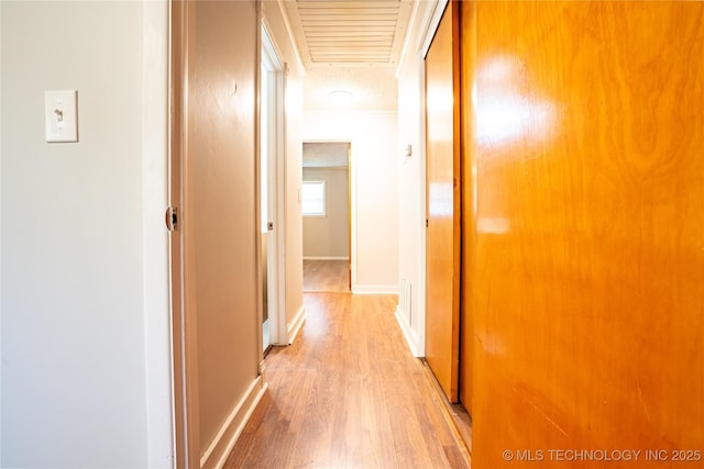 6781 E 26th Pl, Tulsa, OK 74129 - hallway featuring light wood-type flooring and baseboards