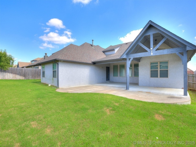 5815 E 144th St S, Bixby, OK 74008 - back of property featuring a patio, stucco siding, and a shingled roof