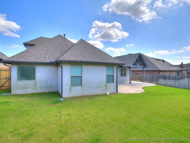 5815 E 144th St S, Bixby, OK 74008 - back of property with a patio, a fenced backyard, roof with shingles, and stucco siding