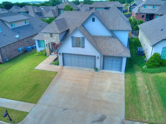 5815 E 144th St S, Bixby, OK 74008 - view of front of house featuring a shingled roof, stucco siding, a residential view, and concrete driveway