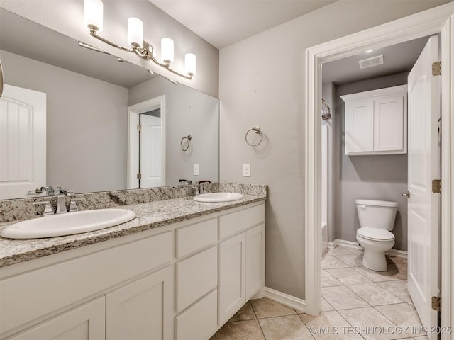 5815 E 144th St S, Bixby, OK 74008 - bathroom with double vanity, tile patterned flooring, and  shower combination