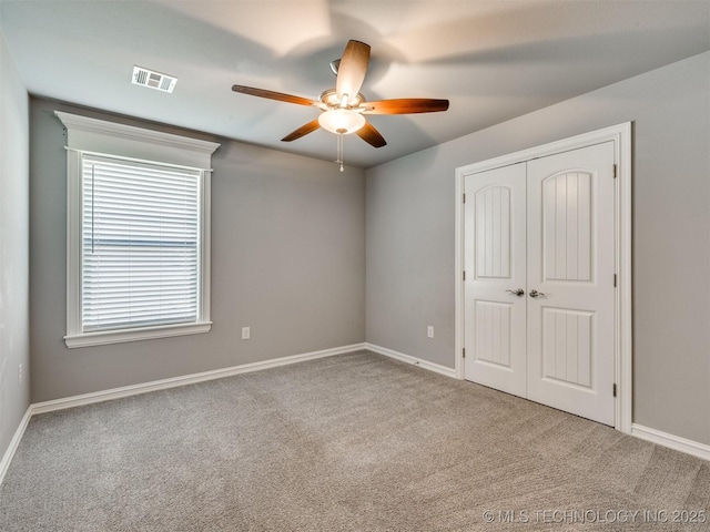 5815 E 144th St S, Bixby, OK 74008 - unfurnished bedroom with carpet flooring and multiple windows