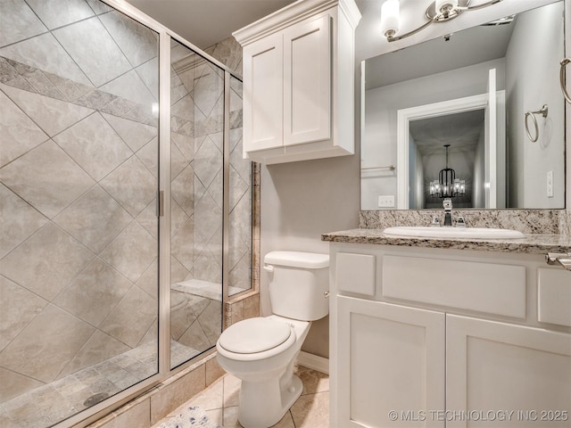 5815 E 144th St S, Bixby, OK 74008 - bathroom with a shower stall, vanity, tile patterned flooring, and a chandelier