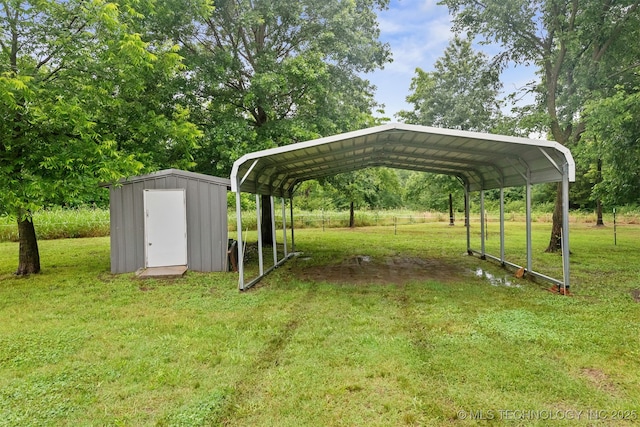 6607 Old Taft Rd, Muskogee, OK 74401 - view of green lawn with a detached carport and a storage unit