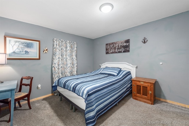 6607 Old Taft Rd, Muskogee, OK 74401 - carpeted bedroom featuring baseboards