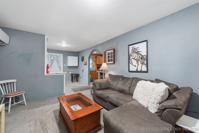 6607 Old Taft Rd, Muskogee, OK 74401 - living room with arched walkways and light colored carpet