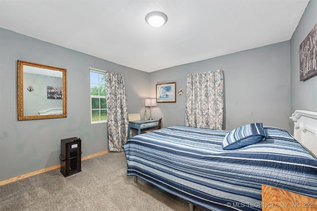 6607 Old Taft Rd, Muskogee, OK 74401 - carpeted bedroom featuring baseboards