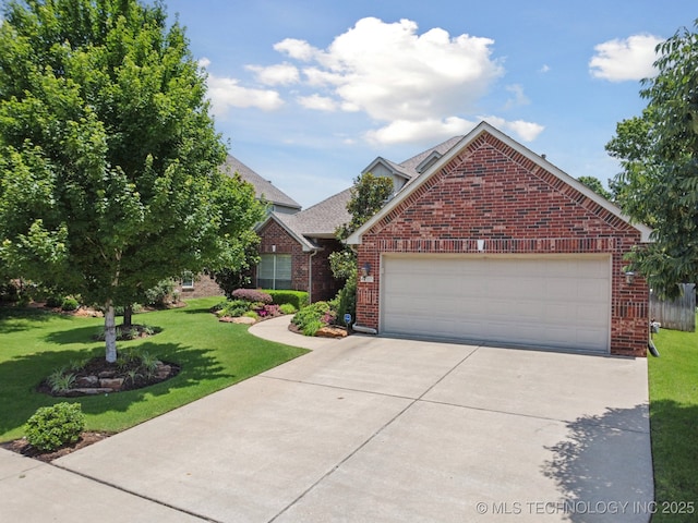 4205 N Narcissus Ave, Broken Arrow, OK 74012 - view of front of property with brick siding, driveway, a front yard, and an attached garage