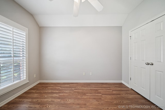 4205 N Narcissus Ave, Broken Arrow, OK 74012 - unfurnished bedroom featuring lofted ceiling, wood finished floors, a closet, and ceiling fan