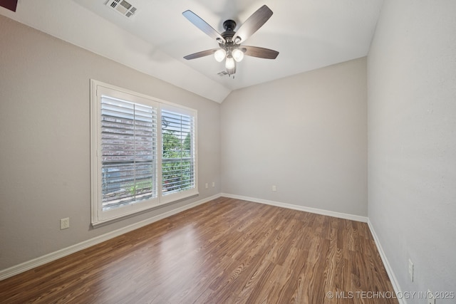 4205 N Narcissus Ave, Broken Arrow, OK 74012 - spare room featuring wood finished floors, ceiling fan, and lofted ceiling