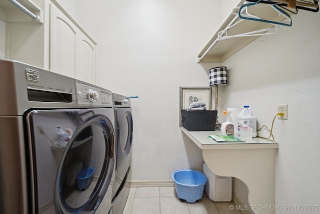 4205 N Narcissus Ave, Broken Arrow, OK 74012 - washroom featuring washer and dryer and light tile patterned floors
